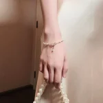 Pearl Bow Charm Bracelet - Image 7